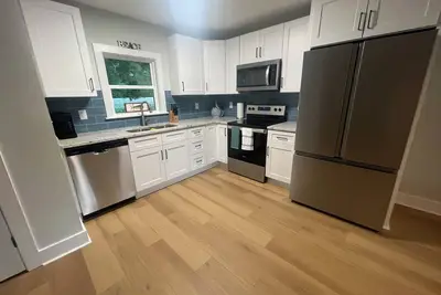 Image de Sunshine Cottage! Professional shuffleboard table! 👀🏝️ Walking distance to Uncw