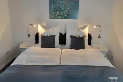 Image de Gästehaus am Bachlauf - Losheim am See \nWohnung 2 - Teichblick
