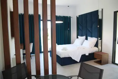 Image de Luxueuse Suite Avec Kitchenette