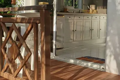 Image de Le Bellier, studio vue mer avec piscine au sel, jardin arboré au calme