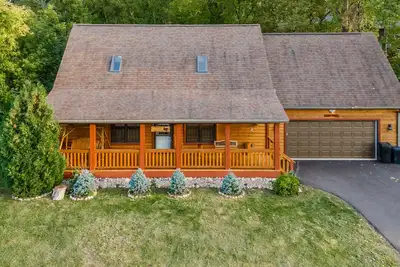 Elina’s  Log Cabin, new on the market, steps from Devil’s Lake State Park.