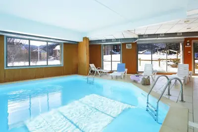 Image de Ski aux pieds! T2 pour 6 + Accès sauna & piscine