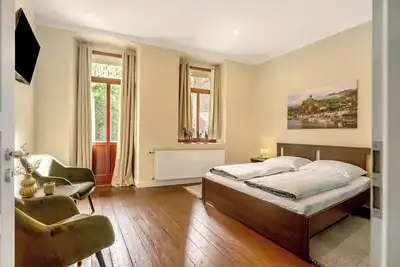 Image de Appartement de vacances \"Alte Stadtvilla Am Weinberg 1\" avec terrasse partagée et Wi-Fi