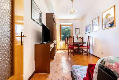 Image de Appartement 'Casa Nel Borgo Rose' avec vue sur la montagne et jardin partagé
