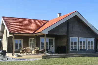 Image de Log cottage by the lake to a high standard