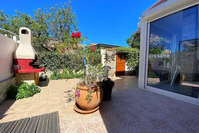 Image de Maison Pmr avec Terrasse, Clim et Parking à 900m de la Mer - 4 Couchages