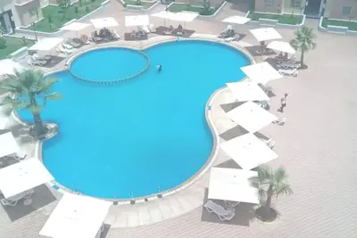 Chez Rime un appartement dans une résidence surveillée avec Piscine