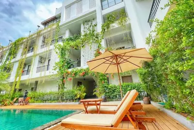 Image de Comfort Room in quiete cozy pool area 5 min from city center!