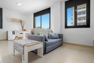 Image de Appartement de vacances 'Pedragosa' près de la plage avec vue montagne, piscine partagée et Wi-Fi