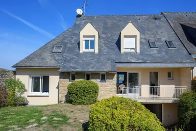Image de Maison de vacances 'Villa Les Pieds Dans L'eau' avec vue sur la mer, terrasse privée et Wi-Fi