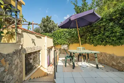 Image de Maison de vacances 'Serenella' avec terrasse privée et climatisation