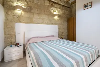 Image de Appartement 'Dimora Donna Lucrezia' avec balcon et climatisation