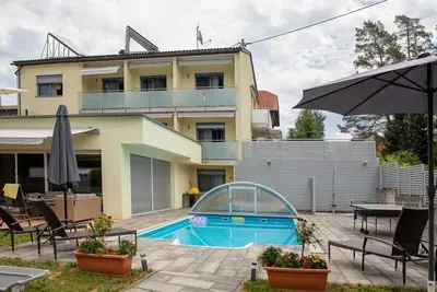 Image de Enjoy Appartements - Appartement1- Gartenseitig