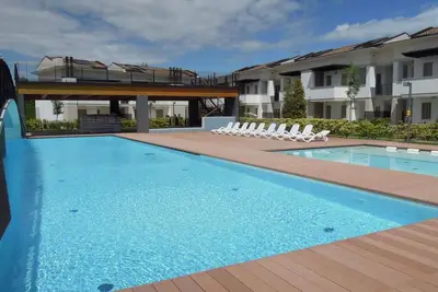 Image de Appartement de vacances avec climatisation, jardin et piscine