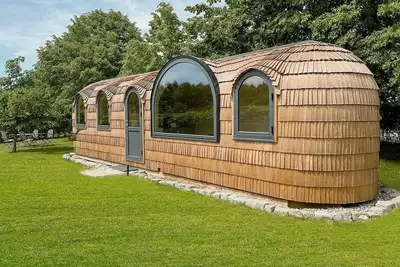 Image de Pure feeling of nature in a sustainable wooden igloo house with gym and pool