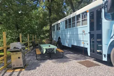 Image de Stationary renovated local school bus. Inquire about our hunter specials!