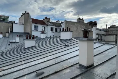 Marais Picasso  space, light, quiet, overlooking Parisian roofs + parking avail.