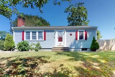 Image de Conveniently-located home with fenced yard, firepit, beach parking pass