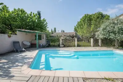 Image de Gïte en pierre, jardin : clim et piscine en été, Jacuzzi et chauffage en hiver.
