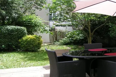 Image de \"Le Jardin de Mounin\" F2 charme, classé 3*- Jardin clos, garage, Vichy centre