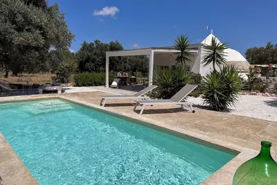 Image de Villa 'Trullo Oscar Con Piscina Privata' avec piscine privée, Wi-Fi et climatisation