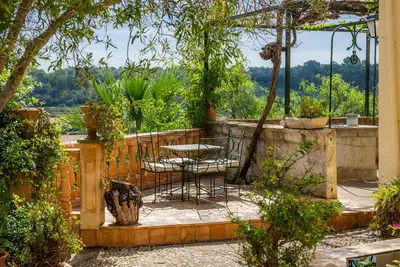Image de Maison de campagne \"Cas Padri Jordi\" avec vue sur les montagnes, terrasse privée et Wi-Fi