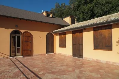 Image de Maison de vacances 'Villa Marta' avec vue sur les montagnes, terrasse et jardin partagé