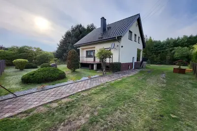 Image de Vacation home on the edge of the forest near a bathing lake
