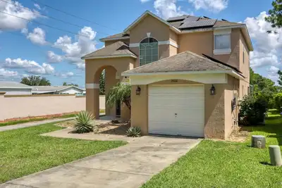 Image de Golf course-view home in gated community with private heated pool