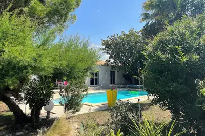 Image de Villa des palmiers avec piscine, 4 chambres, jardins, salle de jeux, barbecue