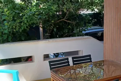 Image de A few minutes from the sea apartment with garden. Pets allowed