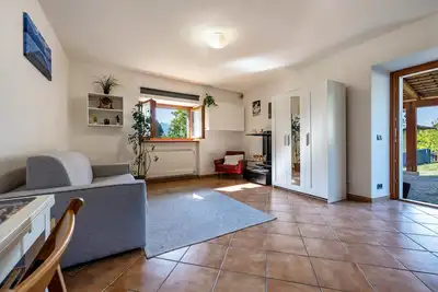 Image de Studio 'Panoramic Green' avec vue sur le lac, terrasse privée et Wi-Fi