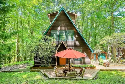 Image de A-frame home in Swanton with firepit, private hot tub, & deck