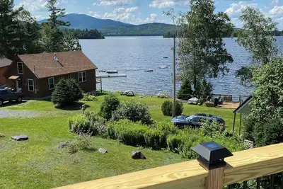 Image de Beautiful lakefront camp with sunset view over big moose mountain