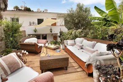 Image de Appartement de vacances \"JardĂn Del Sol\" avec terrasses privĂ©es, jardin privĂ© et Wi-Fi