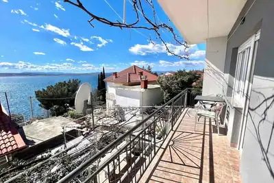 Image de Appartement de vacances avec balcon et vue sur la mer