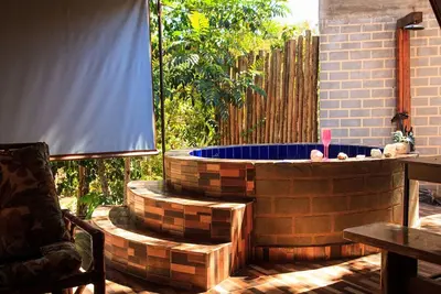 Image de Chalé com churrasqueira e jacuzzi aquecida