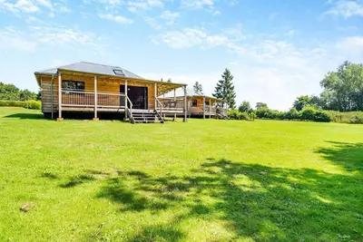 Beautiful wooden cabins in a quiet tranquil setting.