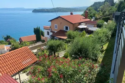 Image de Apartment in a quiet location with beautiful sea views. Just a few minutes' walk to the beach