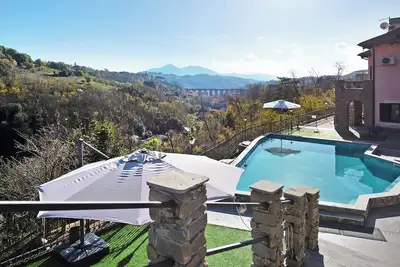 Image de Maison de vacances \"Baia Di Campo\" avec piscine partagée, jardin privé et Wi-Fi