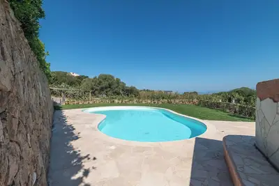 Image de Appartement de vacances \"La Rosa dei Venti\" avec vue sur la mer, piscine partagée et terrasse privée