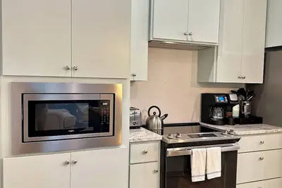 Image de Cozy 3 bed home with hot tub, garage, Ev
