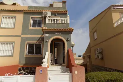 Two bedroom Town house with basement, aircon, communal pool, wifi and sea views