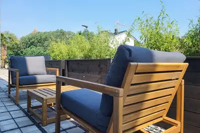 Image de Appartement 'Ferienwohnung Schlossterrassen 4b' avec terrasse privée, jardin partagé et Wi-Fi