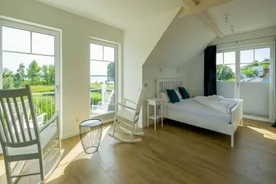 Image de Ferienhaus 4 - Hafengasse 81c - Resort am Stettiner Haff
