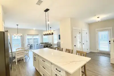 Enjoy The Ocean Breeze just Steps from the Beach!