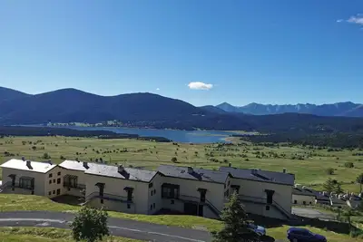 Image de Duplex avec vue sur lac, idéalement placé pour vos vacances d'été et d'hiver!