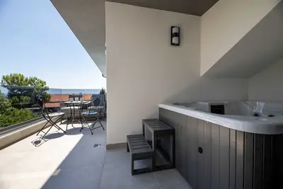 Image de Luxury Apartment Iii. with a private Jacuzzi in Villa Adria Apartments