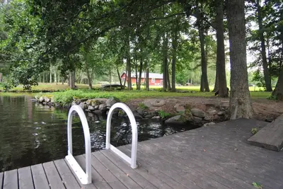 Image de Red and white holiday home beautifully situated by the river EmĂĄn