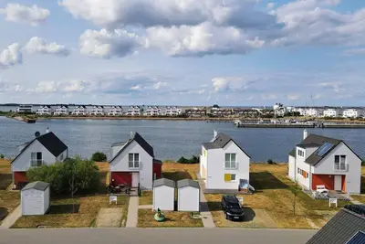 Image de Ferienhaus Boje by Seeblick Ferien Oro, direkte Wasserlage, Sauna